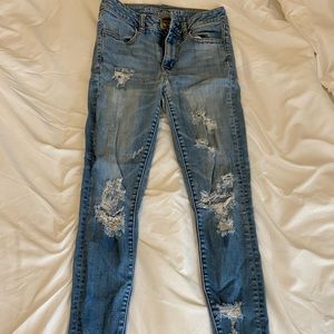 High rise light wash ripped jeans